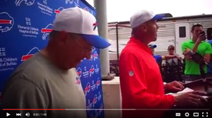 Buffalo Bills Owner Terry Pegula & Head Coach Rex Ryan Take the Dog Biscuit Challenge! - YouTube 2015-08-18 10-50-35