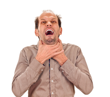 young man showing negative sign on white background