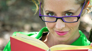 woman reading library book